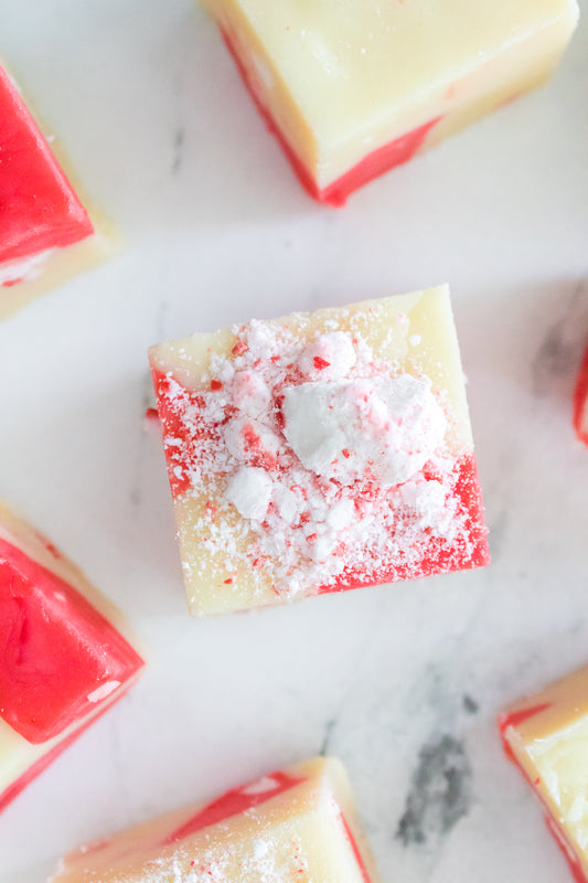 piece of candy cane fudge with crushed peppermint on top