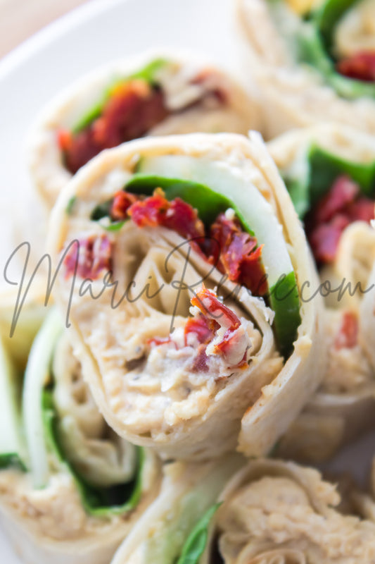 Exclusive: Pinwheels with Hummus, Cucumers and Sun-Dried Tomatoes