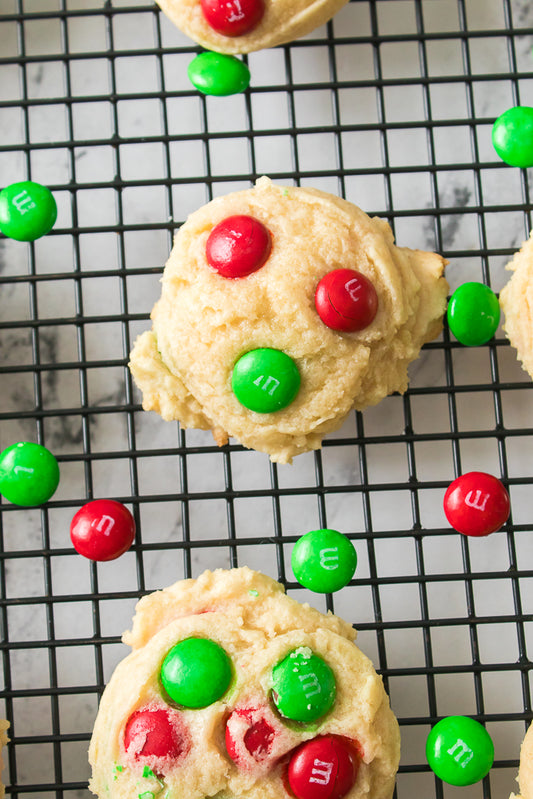 Christmas Cookies with Red & Green M&M's cooling on baking rack