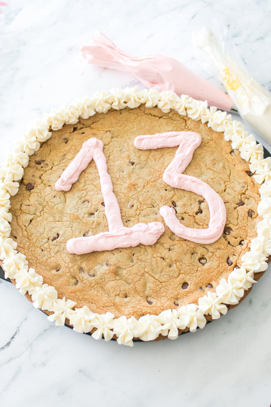 homemade cookie cake with whipped buttercream icing