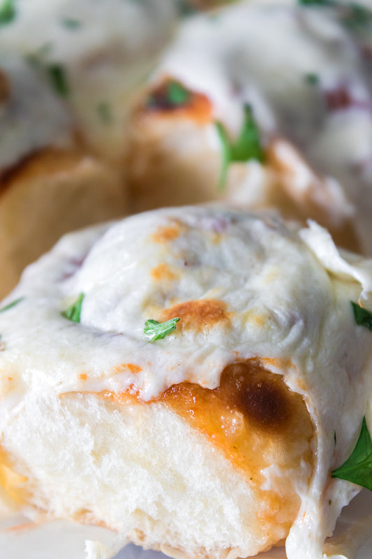 vertical close up shot of meatball sliders recipe